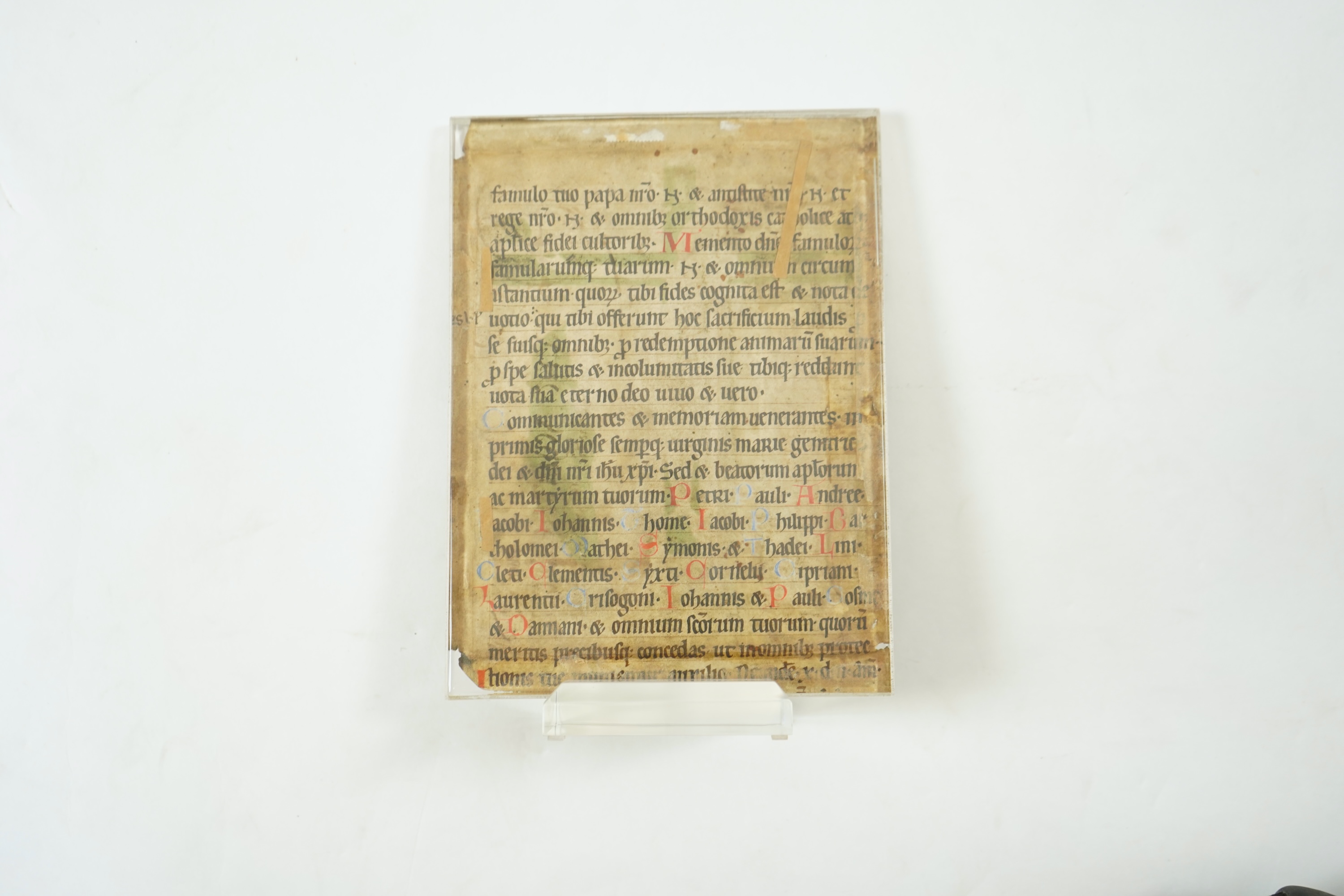 An illuminated leaf from a missal at the Canon, with Crucifixion scene, the reverse inscribed with the Te igitur, probably Austria or South German, second half 12th century